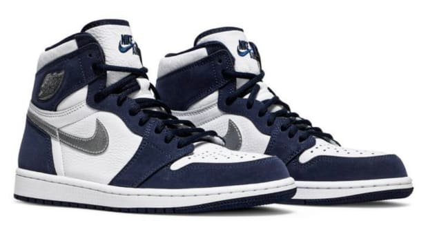 Navy and white Air Jordan shoes.